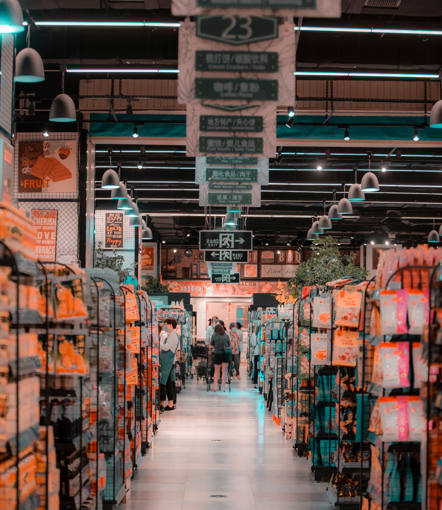 Supermarket aisle with stocked shelves